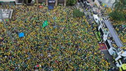 Former Brazil PM denies coup plot as thousands rally in his support